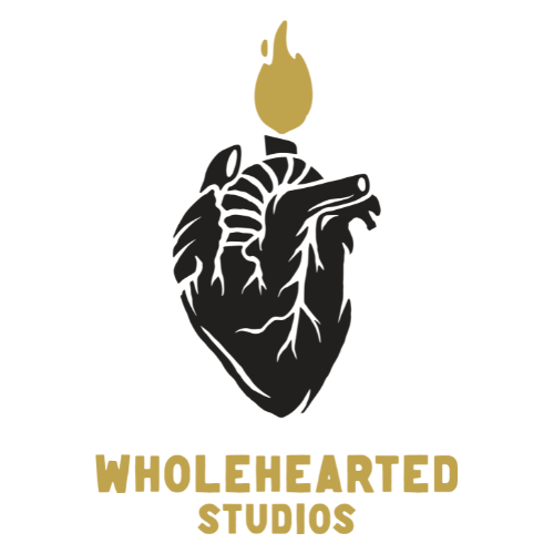 Logo of Wholehearted Studios with a black heart and gold flame on a white background